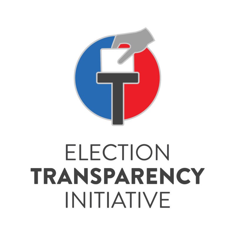 Logo for the Election Transparency Initiative featuring a stylized ballot box with a hand inserting a paper, over a circular red and blue background, and the text Election Transparency Initiative below.